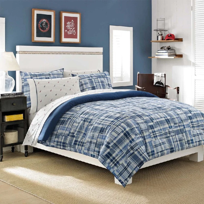 Synthetic - filled comforters like polyester for affordability and hypoallergenic propertiesNautica Newcastle Navy Reversible 3-piece Cotton Comforter Set