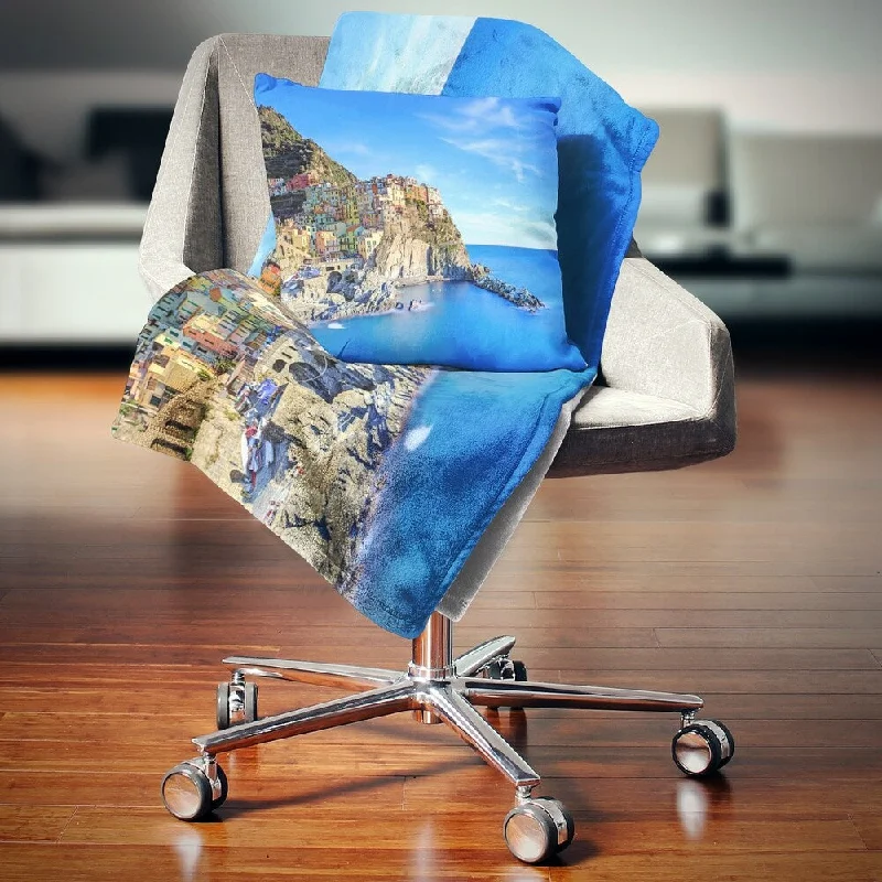 Fleece blankets for a cozy and plush textureDesignart 'Manarola Village in Rocks and Sea' Beach Photo Throw Blanket