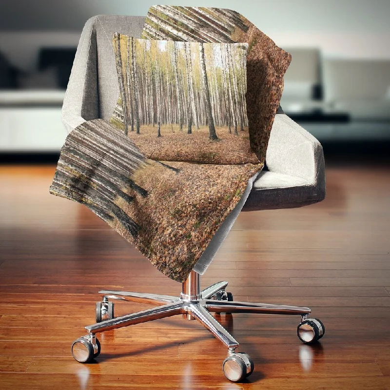 Cotton blankets for breathability and a lightweight feelDesignart 'Beautiful Birch Forest Photography' Modern Forest Throw Blanket