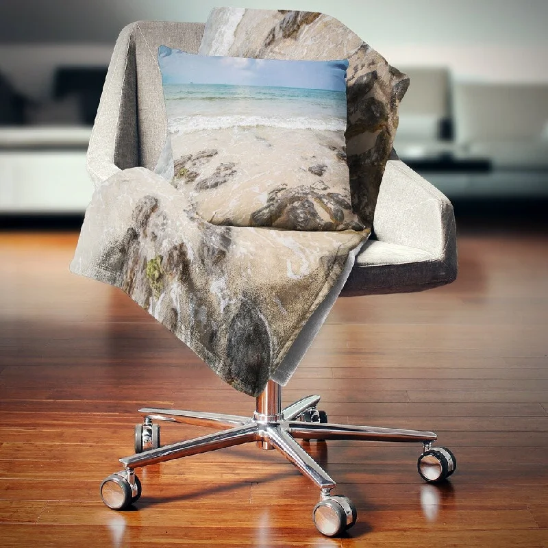 Microfiber blankets that are durable and easy to care forDesignart 'Rocks on Typical Tropical Beach' Beach Photo Throw Blanket
