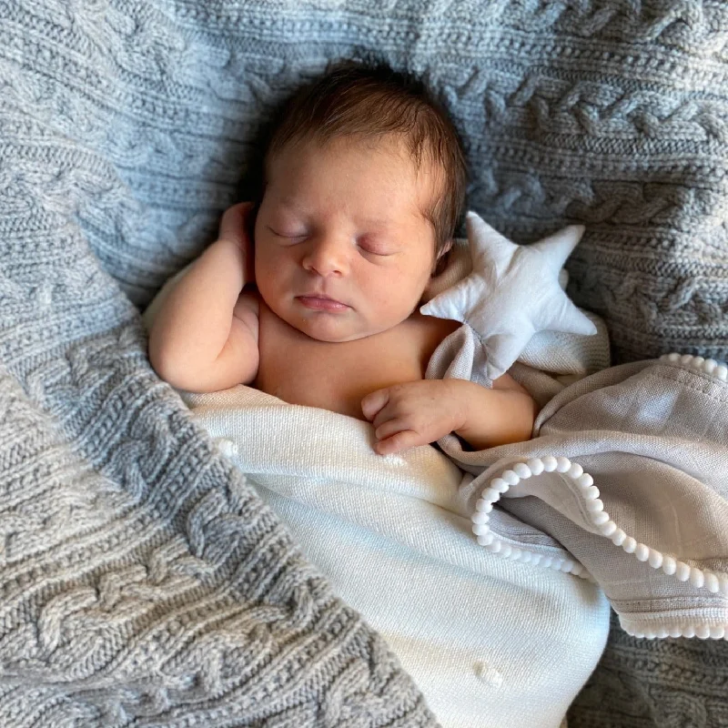 Linen blankets with a rustic and textured lookWelcome Baby Gift Set